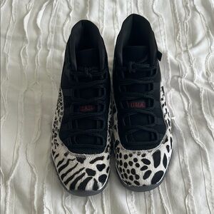 Women's Jordan 11 Black and White Animal Print Sneakers